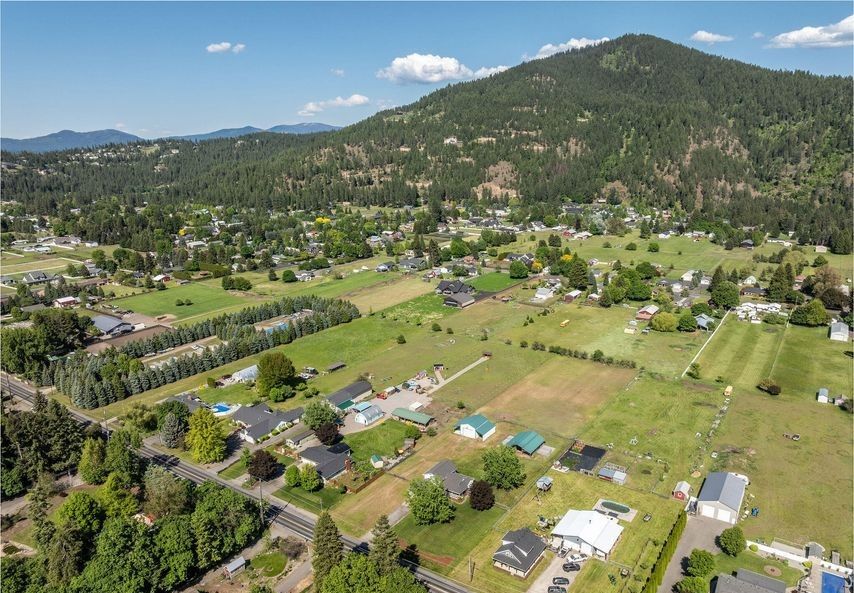 An aerial over the acre lots and open ground of Dalton Gardens. Onyx & Oak Homes builds custom homes in Dalton Gardens, Idaho.